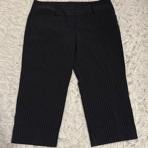 Tracy Evans woman’s dress Pants.  Size 13, black with thin threaded pinstripe.